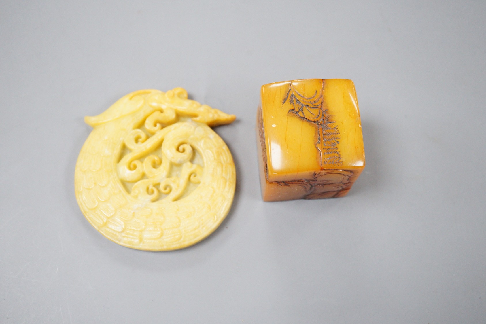 A Chinese soapstone seal, 4.5cm tall, and a hardstone plaque